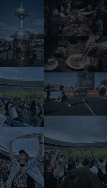 Pessoas em um estádio de futebol.